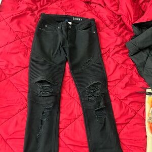 Black moto distressed skinny jeans